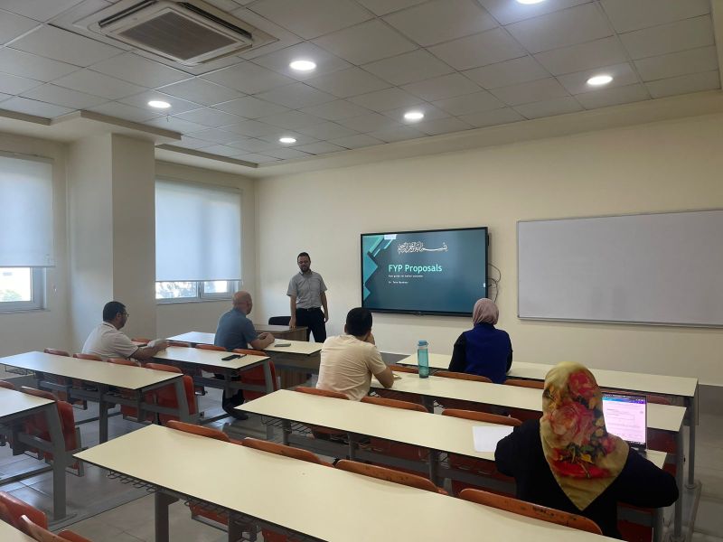 Dr. Taha Basheer presenting the "Final Year Project Proposals" seminar to the IT department staff at Tishk International University.