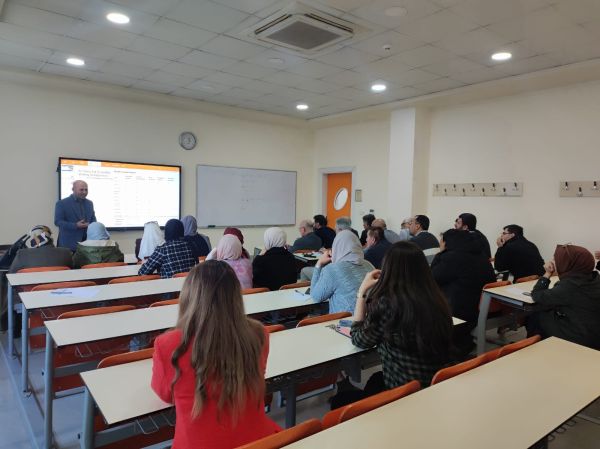 The Trainer is delivering the theory part of the AI training